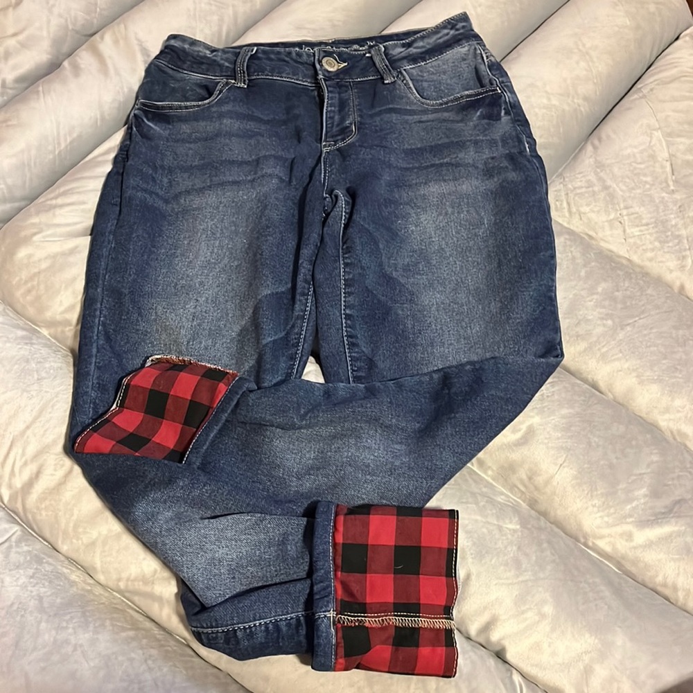 Capri jeans with red plaid cuffs